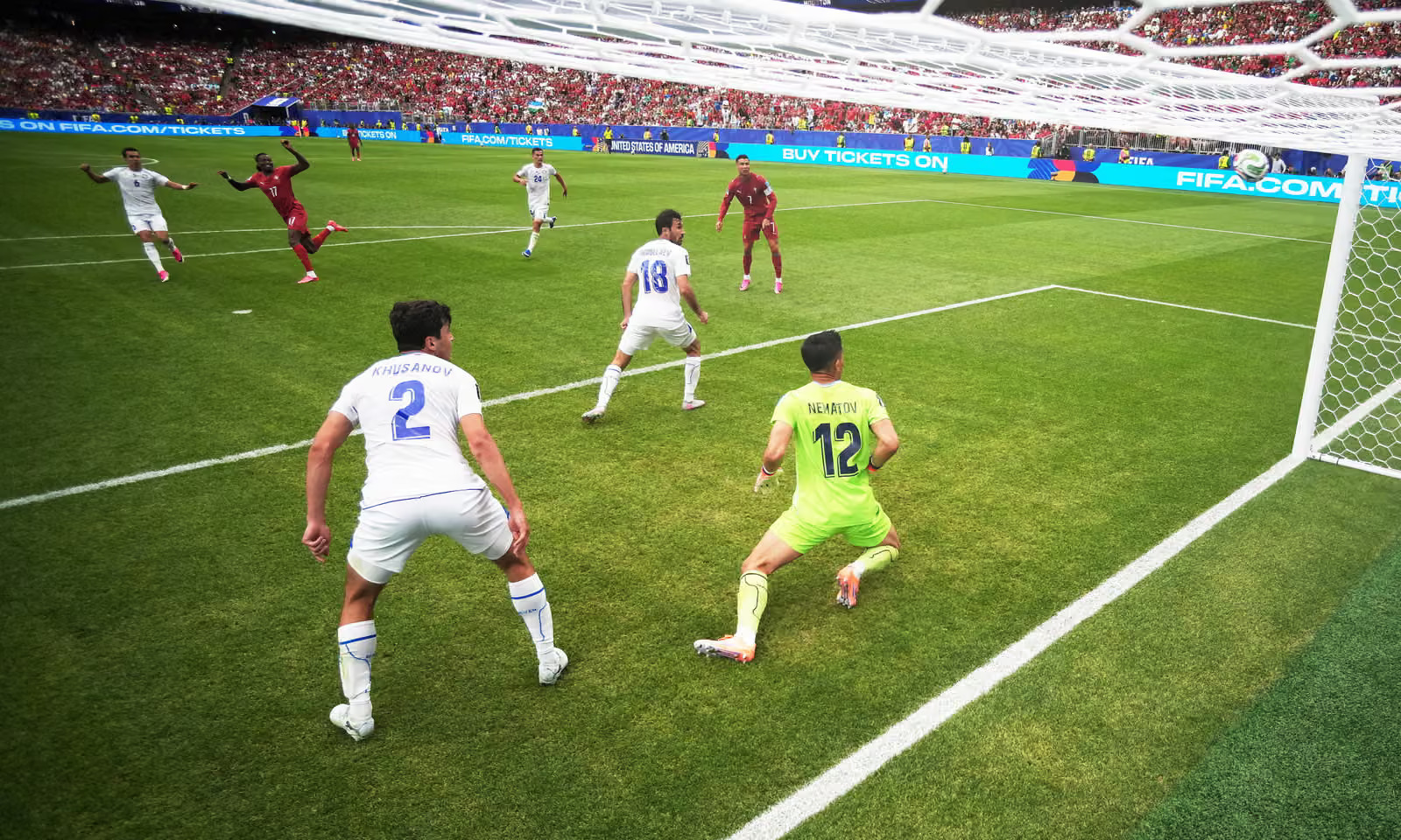 Match action from Portugal versus Uzbekistan